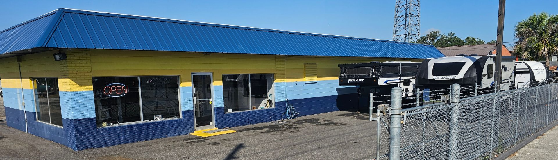 Labries RV dealership showcasing top RV brands like Palomino, Coachmen, Forest River, and more